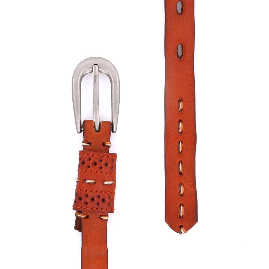 The Bed|Stü Ruby is a brown smooth leather belt featuring a metal buckle, decorative perforations, and visible contrast stitching along its length, displayed partly rolled and partly laid flat.
