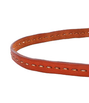 Close-up of the Bed|Stü Ruby strap in smooth brown leather, featuring contrast stitching and metal accents, including a metal buckle, displayed on a white background.