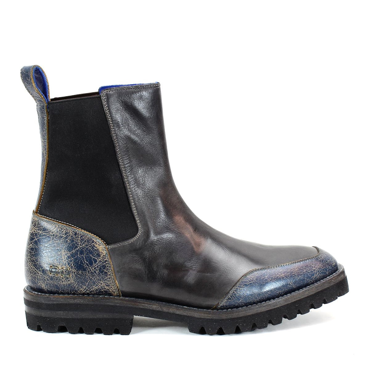 The Salatiel by Bed|Stü is a black leather Chelsea boot featuring a textured blue heel and toe, black elastic side panels, a pull tab, and a rugged black rubber sole, complete with a cushioned leather footbed for all-day comfort.