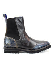 The Salatiel by Bed|Stü is a black leather Chelsea boot featuring a textured blue heel and toe, black elastic side panels, a pull tab, and a rugged black rubber sole, complete with a cushioned leather footbed for all-day comfort.
