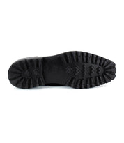 The image displays the black rubber sole of the Bed|Stü Salatiel Chelsea boot, featuring deep, rugged treads and a textured outsole, viewed from the bottom against a white background.