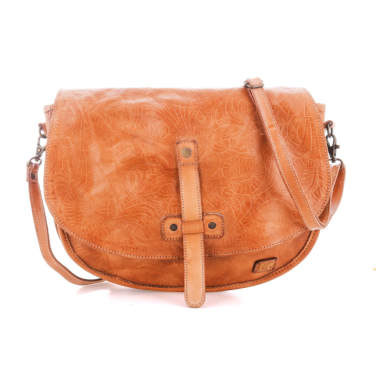 The Bed|Stü Sequoia EM is a tan vegetable-tanned leather crossbody bag featuring a flap closure, detailed embossed pattern, and an adjustable shoulder strap, shown against a plain white background.