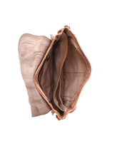 Top view of an open, empty Sequoia EM saddle bag by Bed|Stü, crafted from light brown vegetable-tanned leather with multiple inner compartments, shown against a white background.