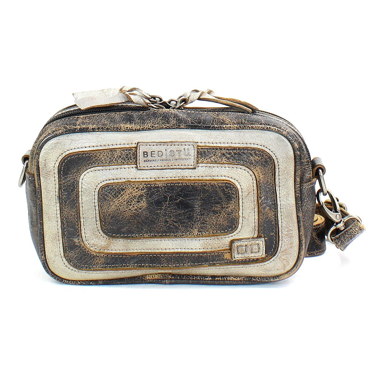 Introducing the Shy by Bed|Stü—a small, compact leather bag in distressed brown featuring white trim, metal hardware, an adjustable strap, and a signature Bed|Stü logo patch. This rectangular-shaped bag offers dual pockets for organized storage and showcases a worn-in, vintage appearance.