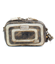 Introducing the Shy by Bed|Stü—a small, compact leather bag in distressed brown featuring white trim, metal hardware, an adjustable strap, and a signature Bed|Stü logo patch. This rectangular-shaped bag offers dual pockets for organized storage and showcases a worn-in, vintage appearance.