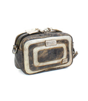 The Shy by Bed|Stü is a small, rectangular distressed leather bag featuring dual zippered compartments and contrasting light and dark panels—an ideal choice for keeping your purse organized.