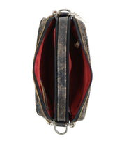 Top view of the Bed|Stü Shy, a compact leather bag featuring a worn finish and vibrant red fabric lining. The open dual-zippered design reveals two spacious main compartments, providing convenient and organized storage in this stylish purse.