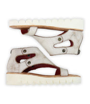 A pair of Bed|Stü Soni II light-colored, open-toe leather platform sandals featuring thick, white, scalloped durable outsoles and distinctive cutout details, displayed side by side.