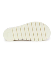 The image features the bottom of the Soni II platform sandal by Bed|Stü, showcasing its white sole with horizontal grooves and a textured grip pattern, emphasizing the durable outsole design.