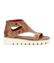 The Bed|Stü Soni II sandal features brown leather construction with a comfortable cutout design, two metal button accents, an open toe, a back zipper, and a white textured durable outsole.