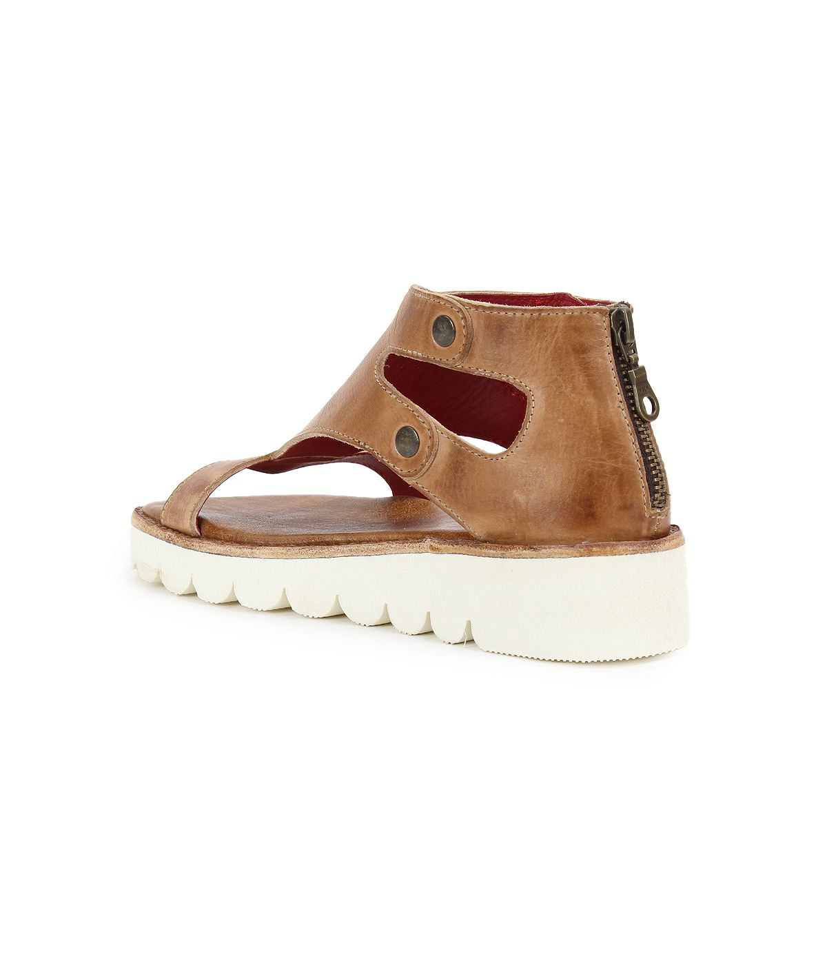 The Bed|Stü Soni II platform sandal features brown leather with cutout detailing, metal rivets, a white ridged durable outsole, and a back zipper, displayed at an angle on a white background.