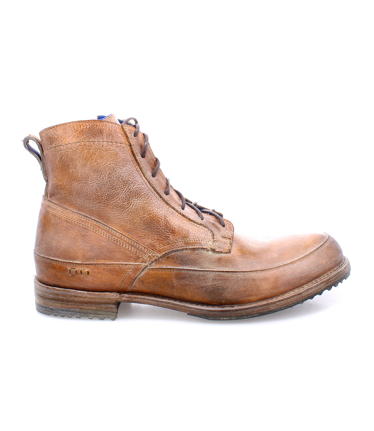 The Bed|Stü Spiker is a brown men’s lace-up boot with a slightly worn look, visible stitching, and a low rubber-heeled sole. It features a cushioned insole for added comfort and is photographed from the side on a white background.