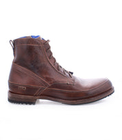 Introducing the Spiker boot by Bed|Stü—a classic men’s lace-up crafted from brown leather with a round toe, slight heel, and textured sole. Designed for comfort with a cushioned insole, this boot is shown in a side profile against a white background.