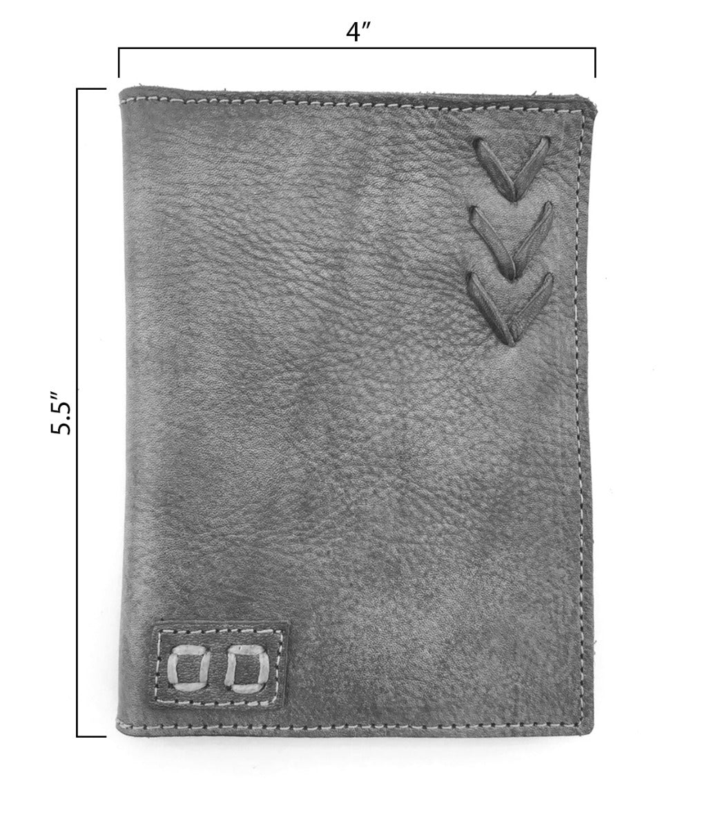 The Stardust travel wallet by Bed|Stü is a rectangular gray accessory, handcrafted from distressed leather with stitched details, measuring 4 inches wide by 5.5 inches tall and shown flat on a white background.