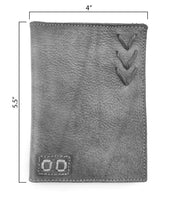 The Stardust travel wallet by Bed|Stü is a rectangular gray accessory, handcrafted from distressed leather with stitched details, measuring 4 inches wide by 5.5 inches tall and shown flat on a white background.