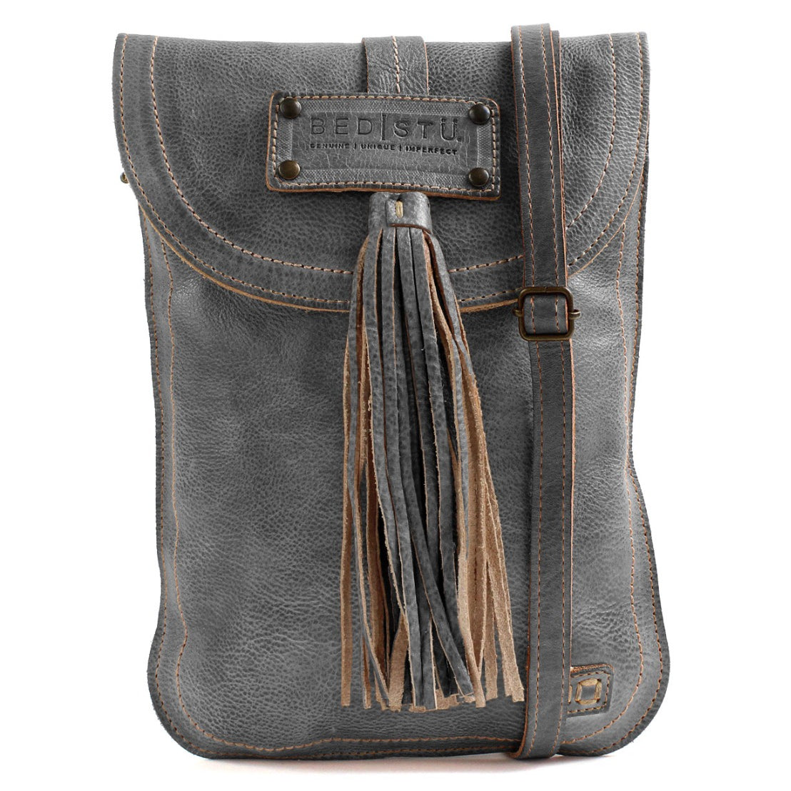 Sterling by Bed|Stü: a gray leather crossbody bag featuring brown stitching, a front tassel detail, an adjustable strap, and a rectangular Bed|Stü logo patch on the flap.