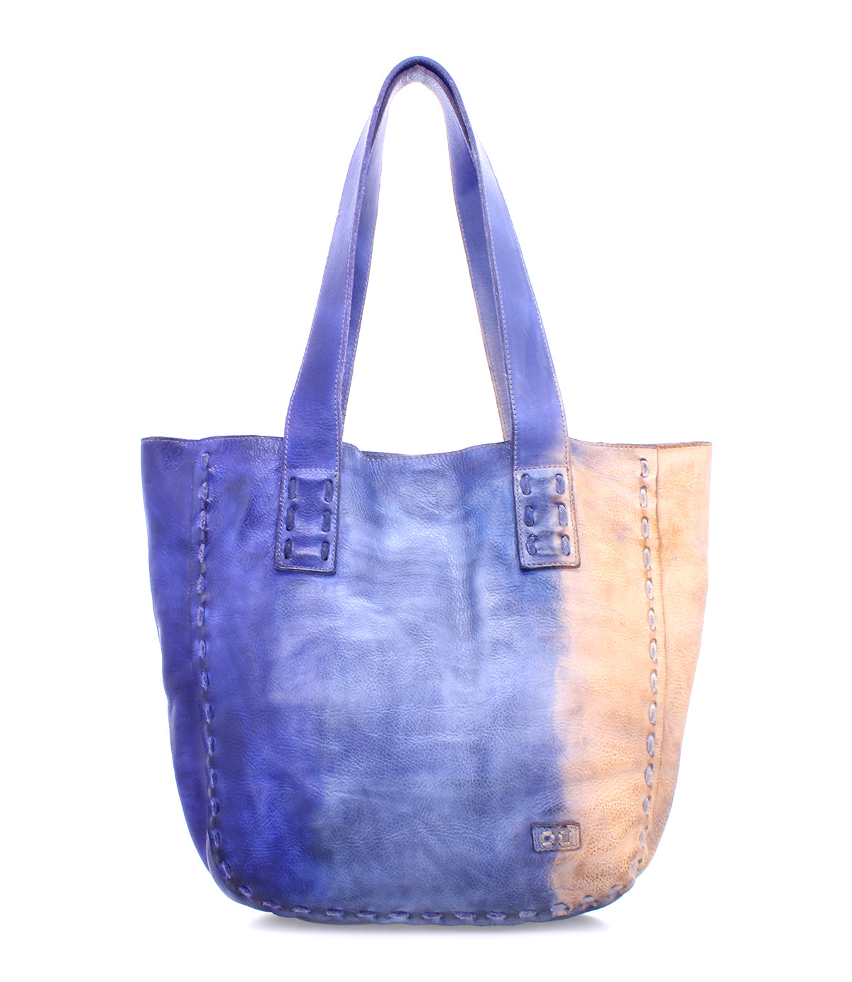 The Stevie by Bed|Stü is a vintage-inspired leather tote designed for everyday use, featuring two handles and a stunning gradient color that gracefully shifts from blue on the left to tan on the right.