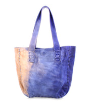 Introducing the Stevie by Bed|Stü—a two-toned leather tote bag with tan on one side and blue on the other, featuring double handles and visible edge stitching. This versatile vintage-inspired bag is perfect as your everyday carry for any occasion.