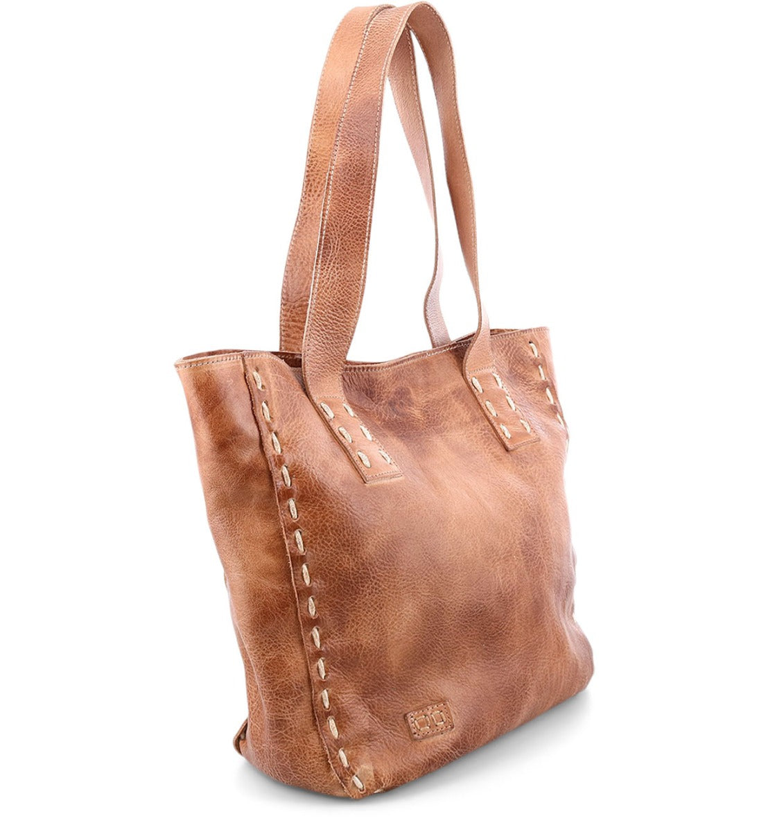 The Bed|Stü Stevie—an upright brown leather tote with double shoulder straps and striking white edge stitching—offers a classic look perfect for everyday carry.