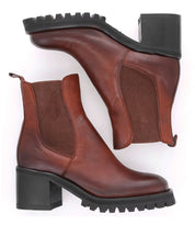 The Surge boots by Bed|Stü are a pair of brown Italian leather Chelsea boots featuring black chunky heels and treaded soles, displayed from the side view on a white background.