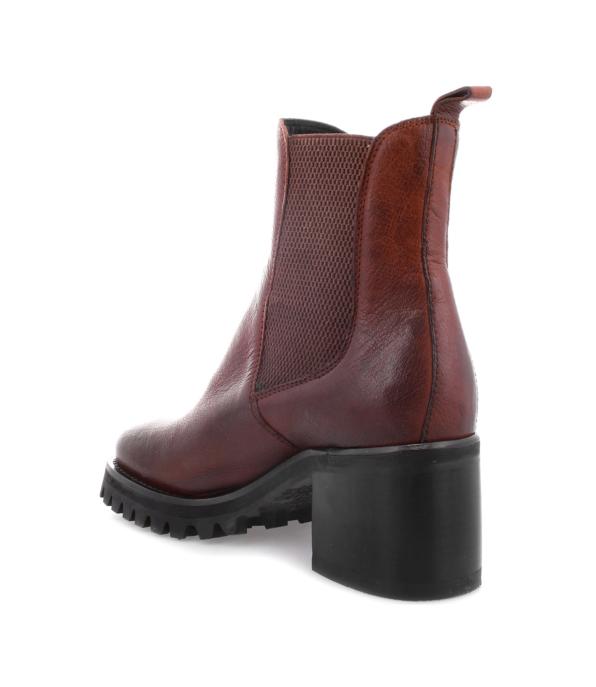 Introducing Surge by Bed|Stü—a brown Italian leather Chelsea boot featuring a chunky black heel and a treaded sole, displayed from an angled rear side view.
