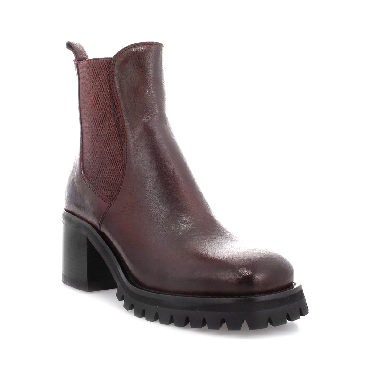 The Bed|Stü Surge is a dark red Italian leather Chelsea boot featuring a square toe, block heel, black lug sole, and side elastic panels, displayed at a three-quarter angle on a white background.