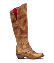 Takoma by Bed|Stü: A tall brown leather boot featuring a unique asymmetrical folded top, braided strap detail, low stacked Western-style heel, square toe, and signature red interior lining, shown in profile view facing right.