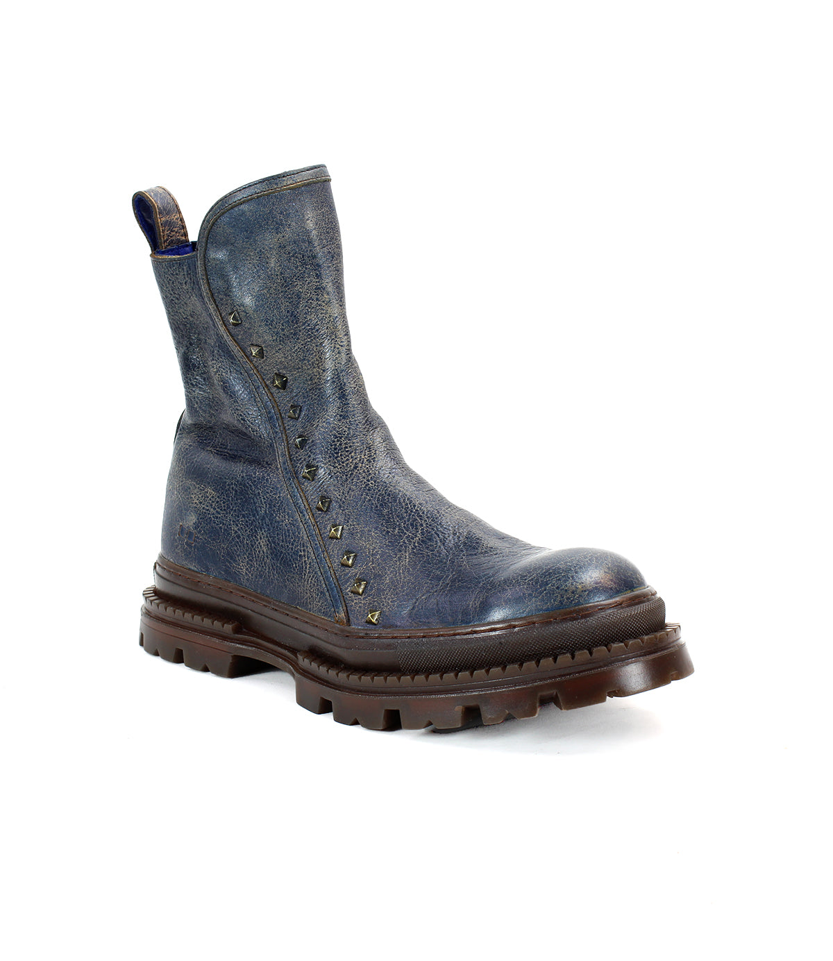 Introducing the Bed|Stü Tanto: a single, rugged blue leather ankle boot featuring a durable leather upper, thick brown lug outsole, and small metal studs along the side, photographed against a white background.