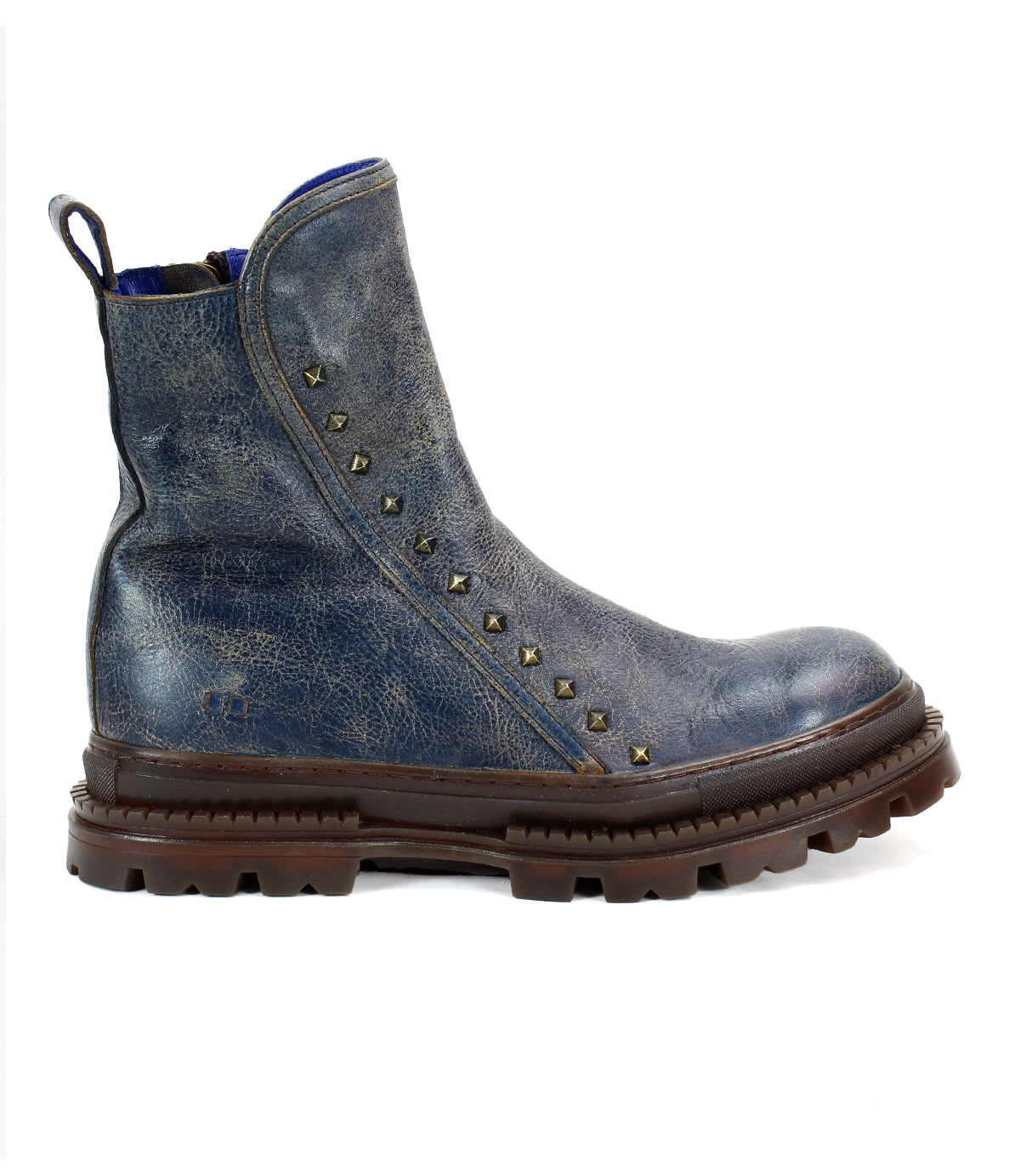 The Tanto boot by Bed|Stü is a streamlined blue design featuring a leather upper, rugged lug outsole, and decorative metal studs along the side.