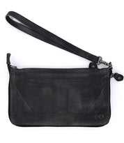 The Bed|Stü Templeton II, a black leather wristlet clutch with a zipper closure and detachable wrist strap, is showcased on a white background and effortlessly transitions from a sleek wallet to a chic crossbody for versatile styling.