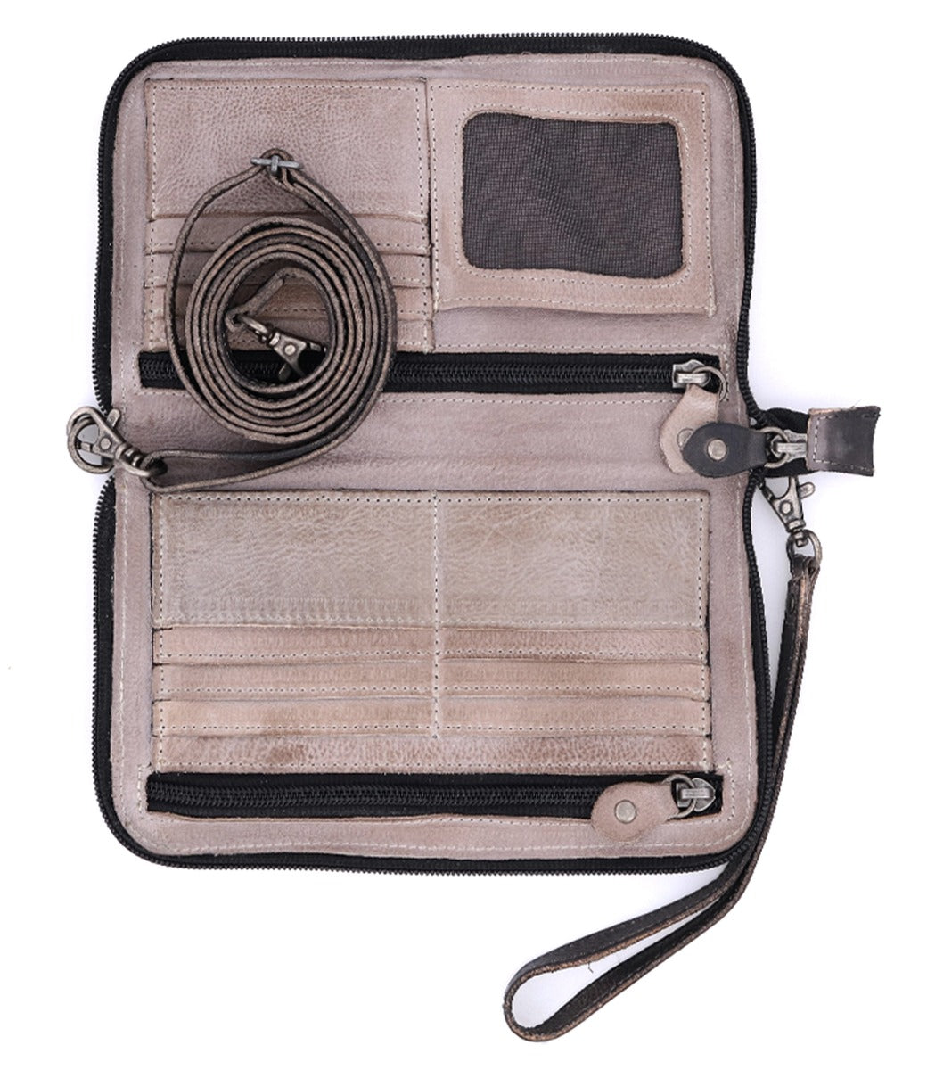 Introducing the Bed|Stü Templeton II: an open beige leather wallet featuring multiple card slots, zippered compartments, a mesh ID window, and a detachable strap tucked inside—making it simple to convert this stylish accessory into a chic leather crossbody or clutch for versatile everyday use.