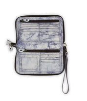 Displayed on a white background, the Bed|Stü Templeton II is an open marbled leather wallet featuring a zipper closure, multiple card slots, two zippered pockets, an ID window, and a wrist strap—perfectly sized to use as a clutch or to slip inside your favorite leather crossbody bag.