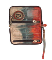 Introducing the Templeton II by Bed|Stü—a zippered leather wallet featuring a striking red and blue gradient, multiple card slots, two zip pockets, a clear ID window, and a detachable matching strap tucked inside. Use it as a versatile crossbody or clutch for effortless style.