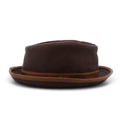 Introducing the Turino by Bed|Stü—a crushable brown leather fedora featuring a darker crown and a lighter brown brim, displayed from the front against a white background. This handmade, lightweight leather hat blends style and comfort for any occasion.