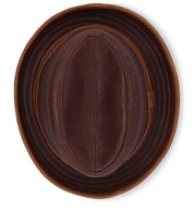Introducing the Turino by Bed|Stü—a lightweight, handmade leather hat captured from above, highlighting its distinctive oval shape, visible stitching details, and a small side loop.