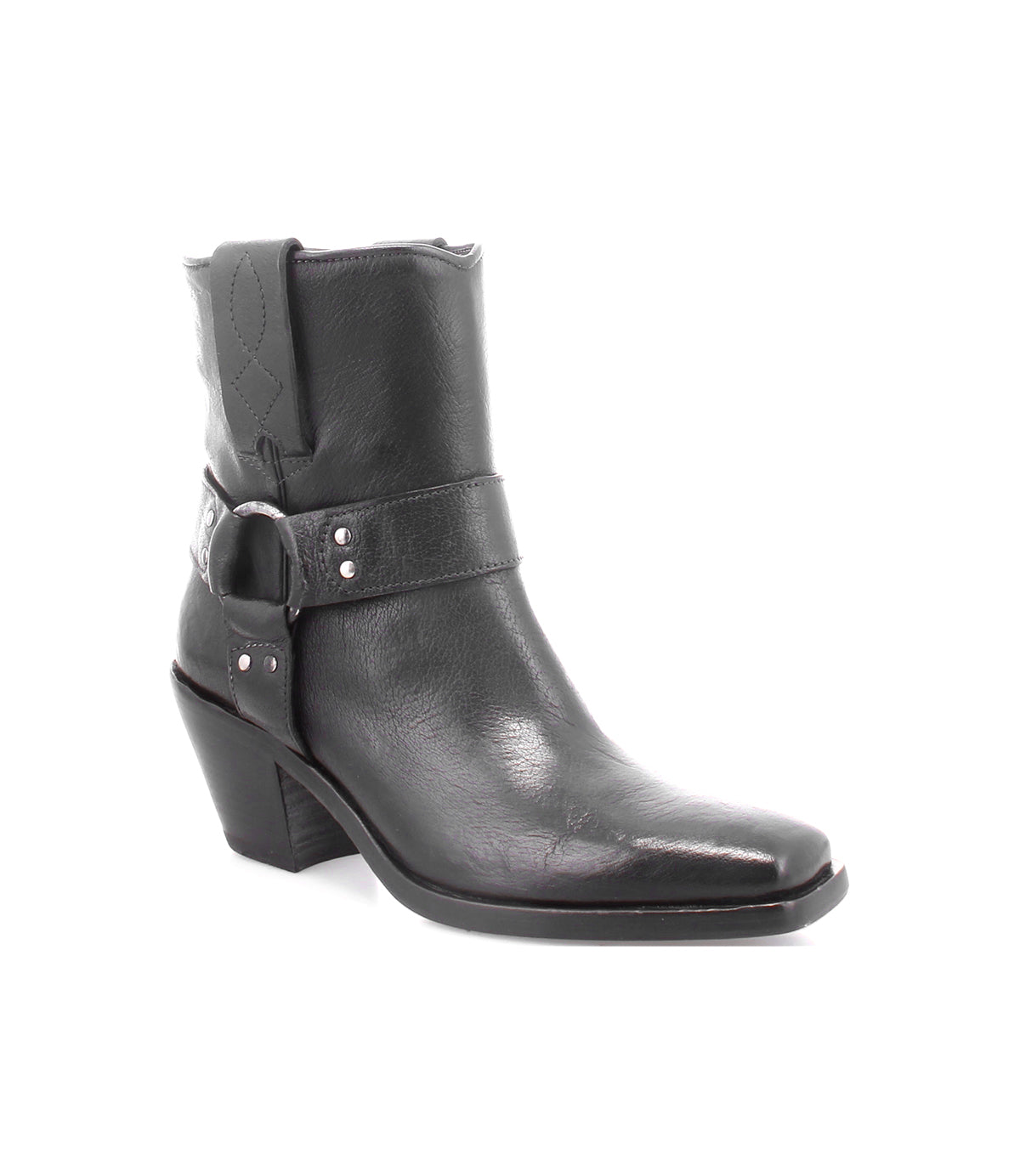 The Bed|Stü Vamoose is a black Italian leather ankle boot with a low heel, side buckle strap, decorative stitching, and a pointed toe in a modern harness-boot style, displayed against a white background.