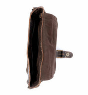 Top view of an open, empty Bed|Stü Venice Beach brown canvas crossbody bag with a buckle and adjustable strap, isolated on a white background.
