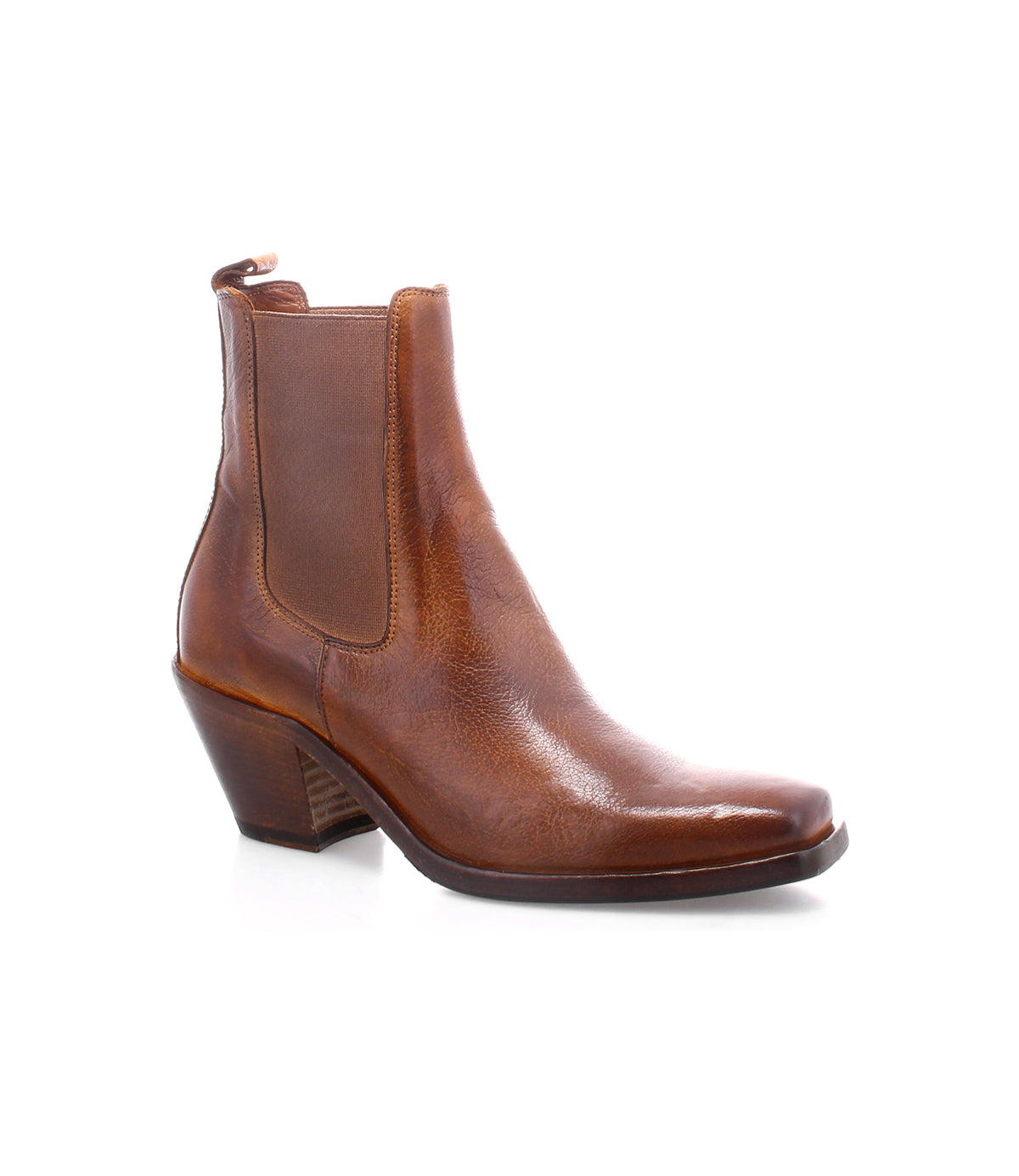 The Bed|Stü Viscera is a brown full-grain leather ankle boot featuring a pointed toe, side elastic panels in classic Italian Chelsea boot style, a back pull tab, and a medium block heel, displayed on a white background.