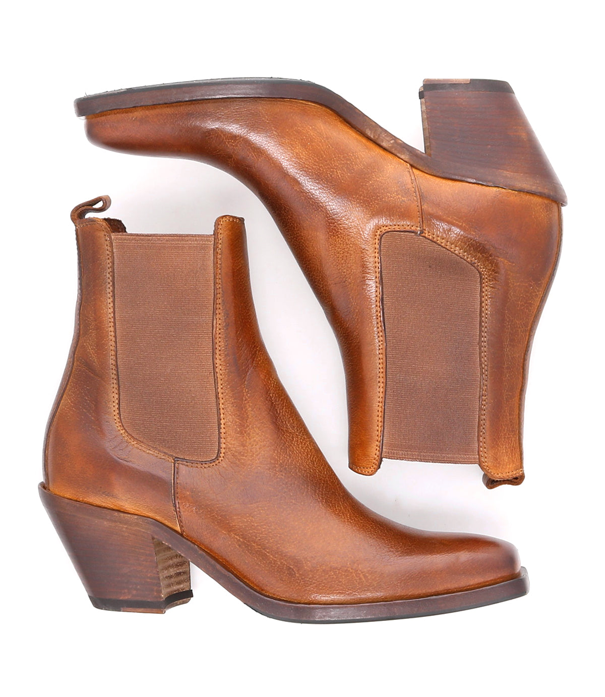 A pair of Bed|Stü Viscera boots in brown full-grain leather, featuring heeled Chelsea styling with elastic side panels and pull tabs, displayed side by side on a white background.