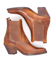 A pair of Bed|Stü Viscera boots in brown full-grain leather, featuring heeled Chelsea styling with elastic side panels and pull tabs, displayed side by side on a white background.