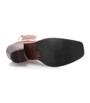 Bottom view of the Bed|Stü Viscera in brown full-grain leather, featuring a smooth black sole, stacked heel, and pointed toe.