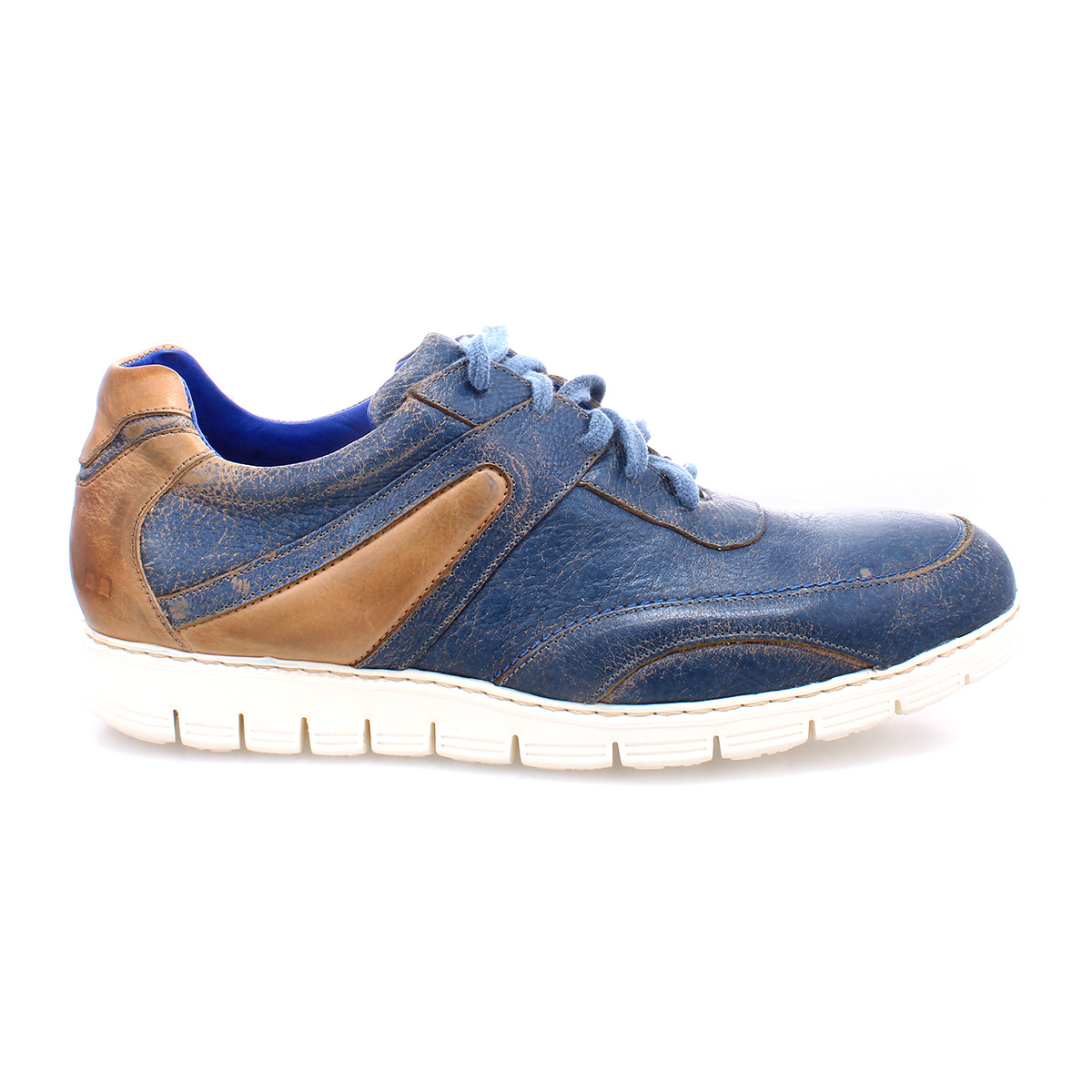 The Bed|Stü Wardell is a blue and brown layered leather sneaker with a modern edge, showcasing blue laces, contrasting stitching, and a white rubber sole—all shown from the side against a white background.