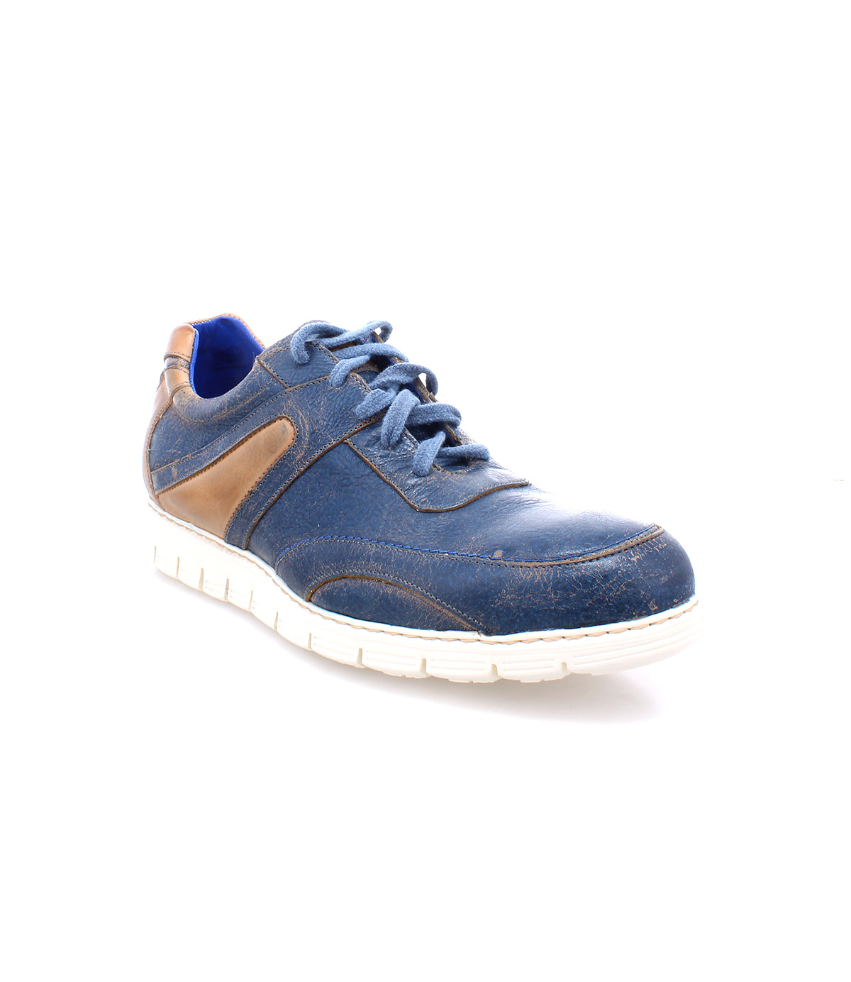 Bed|Stü's Wardell sneaker in blue and brown layered leather, featuring a cushioned sole and white base, is photographed on a white background at an angle highlighting the front and outer side for a modern edge.