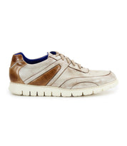 The Bed|Stü Wardell sneaker features beige and brown layered leather with a white cushioned sole, blue inner lining, and textured detailing on the side and heel, bringing a modern edge to any casual look.