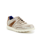 The Bed|Stü Wardell sneaker features beige and brown layered leather, a white cushioned sole, lace-up closure, and a blue inner lining, photographed on a white background for a modern aesthetic.