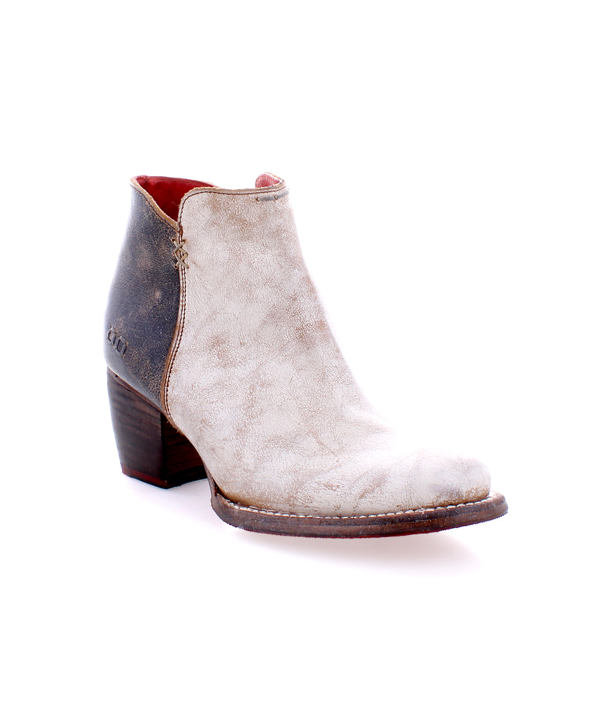A single Bed|Stü Yell boot, featuring distressed handmade leather, a stacked heel, side zipper, and a slightly worn look, is photographed on a white background.