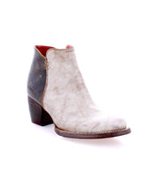 A single Bed|Stü Yell boot, featuring distressed handmade leather, a stacked heel, side zipper, and a slightly worn look, is photographed on a white background.