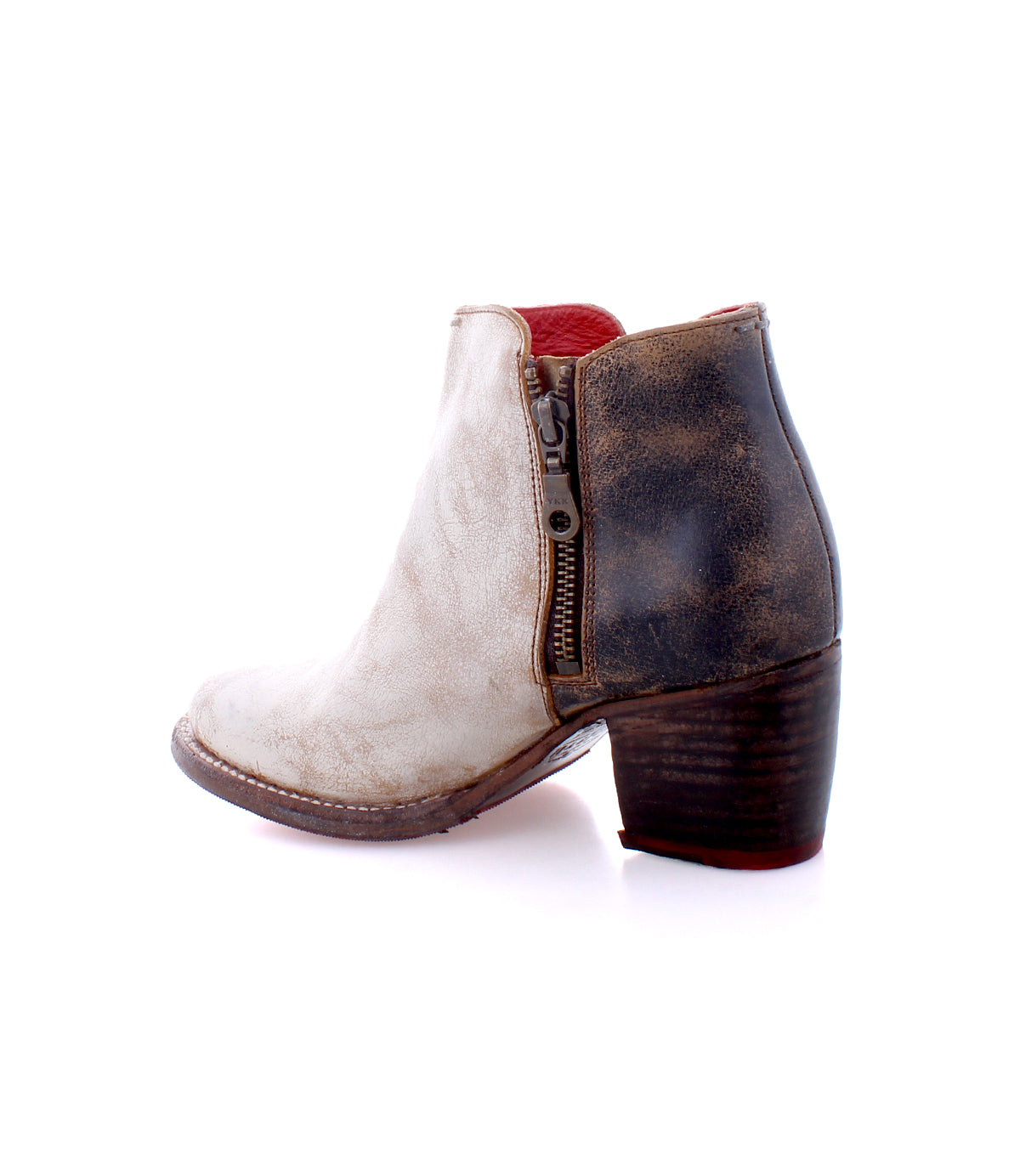 Side view of the Bed|Stü Yell women's ankle boot, showcasing a white front, brown distressed heel, side zipper, and chunky heel on a white background—expertly crafted, handmade leather boots with a durable Vibram outsole.