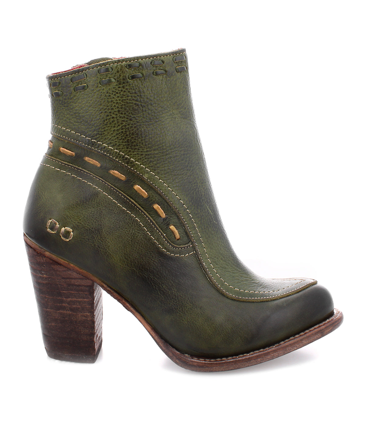 Introducing the Yuno by Bed|Stü: a green leather ankle boot featuring a chunky brown heel, decorative stitching, and cut-out details near the top and side. Designed with breathable cushioning for all-day comfort, these elevated heel boots are finished with subtle contrast leather accents for added style.