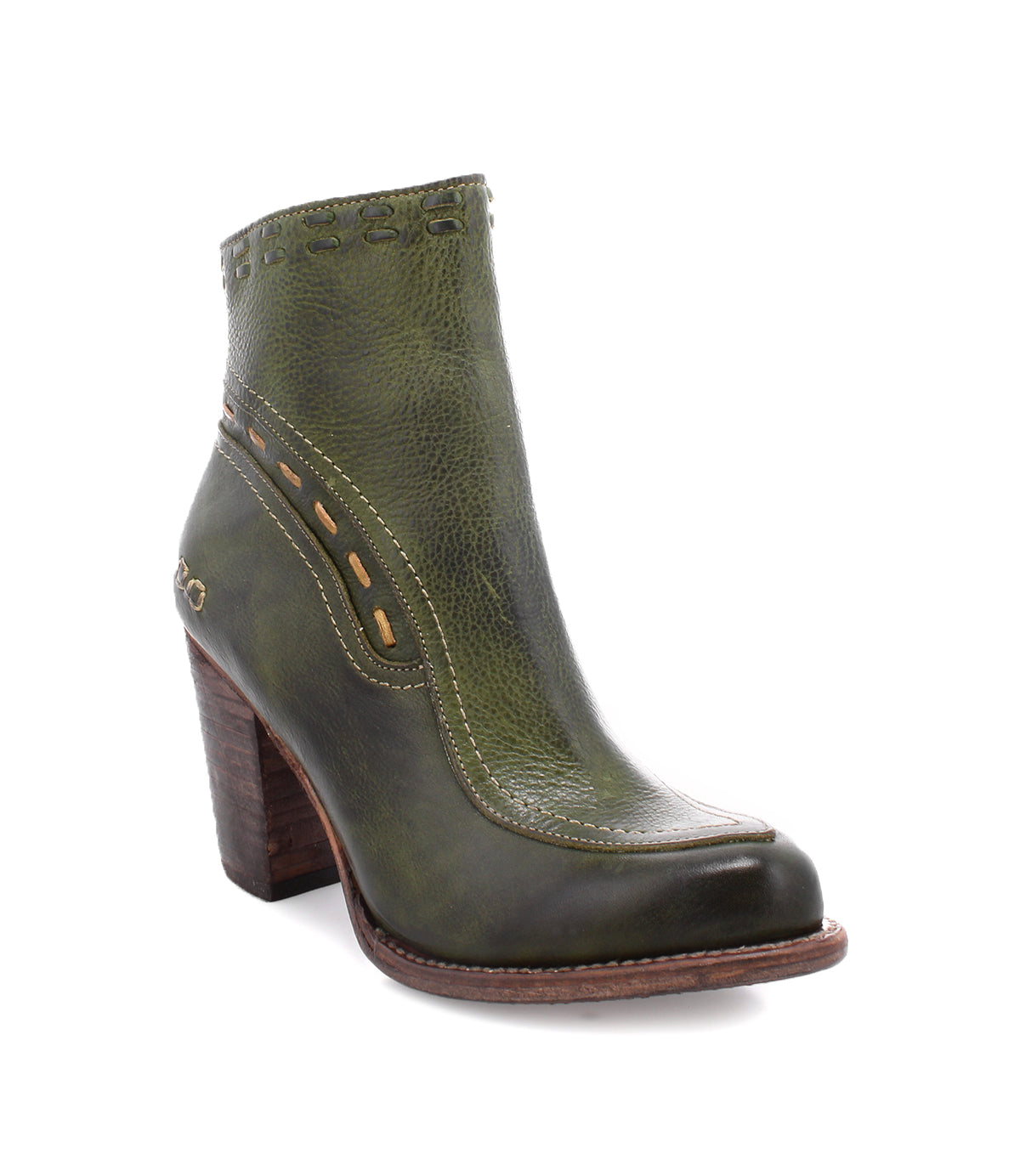 Introducing the Yuno by Bed|Stü: a green leather ankle boot accented with brown stitching and contrasting leather details, designed with a convenient side zipper, breathable cushioned insole, and a chunky wooden heel for an effortlessly stylish touch.
